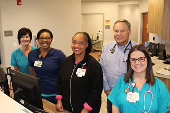 Dr. James McCriskin (4th from left) poses with Cape Fear Heart Associates colleagues Diane, Ashia, Sabrina and Amber.Dr. James McCriskin (4th from left) poses with Cape Fear Heart Associates colleagues Diane, Ashia, Sabrina and Amber.